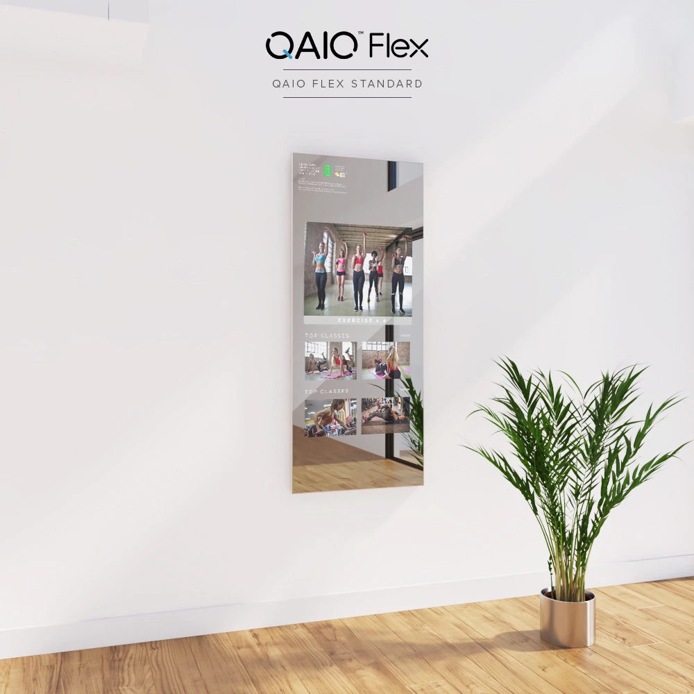 QAIO Flex Fitness Mirror Standard in a minimalist London setting, reflecting modern style.