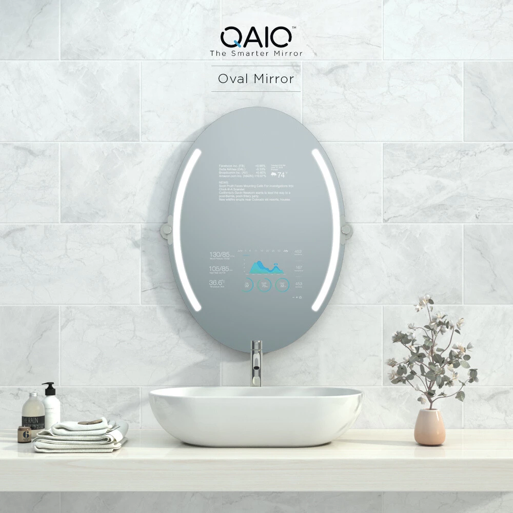 QAIO oval smart mirror TV with LED strips, elegantly displayed in a Bristol bathroom.